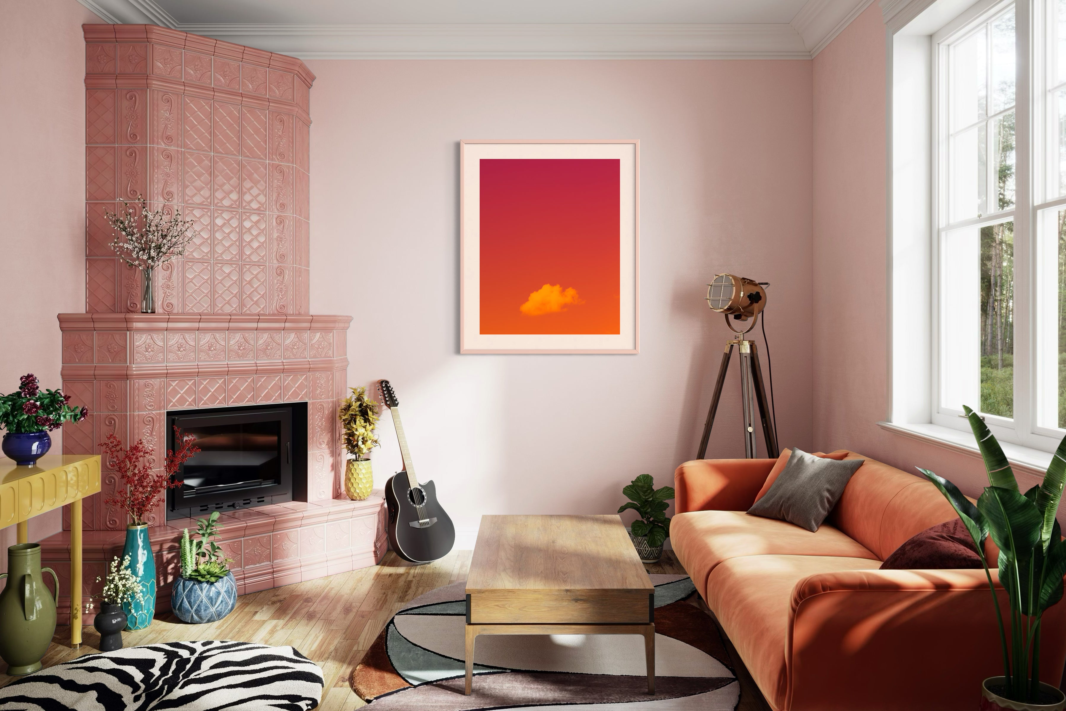 warm tone photo of single cloud in black frame with white matte on pink wall in colorful living room