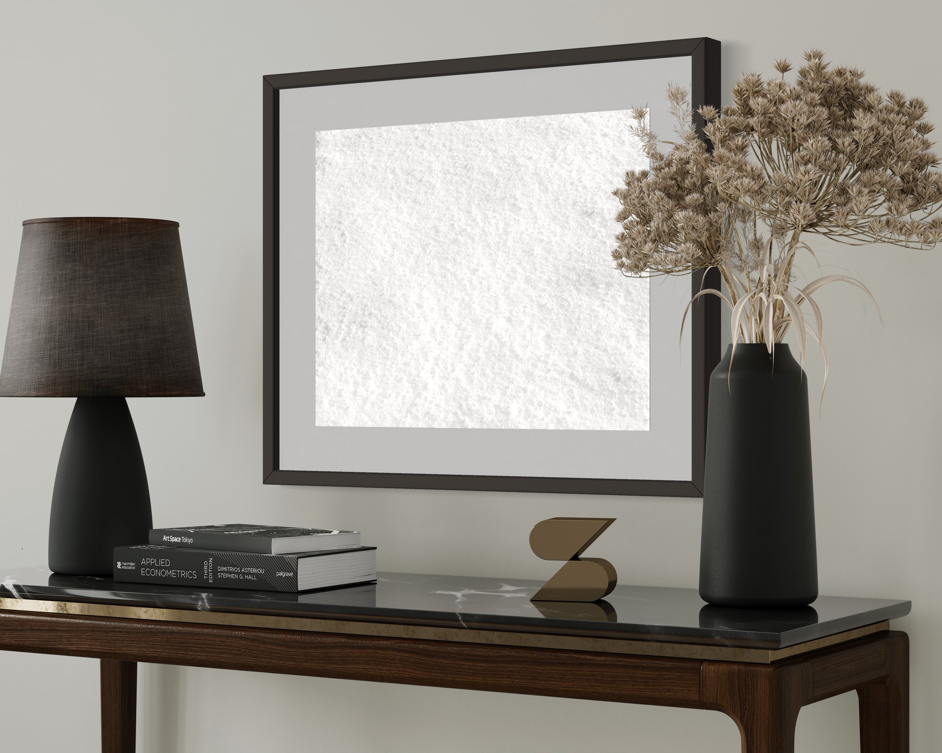 Close up photo of fresh white clean snow in dark gray frame above small table on light gray wall