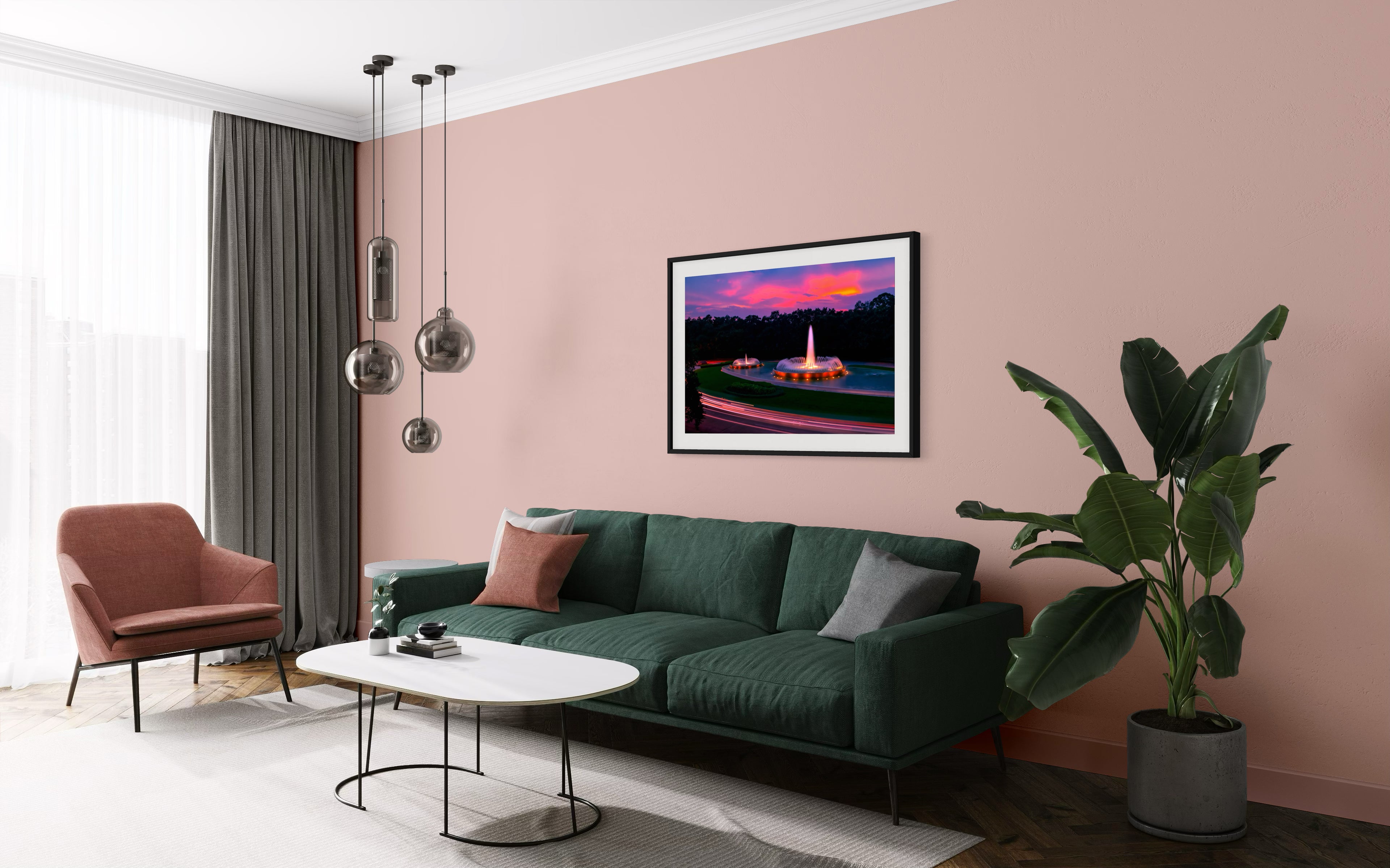 photo of Mecom Fountain in Houston shot at sunset with blurred car lights at the bottom on pastel pink wall above green couch with window light