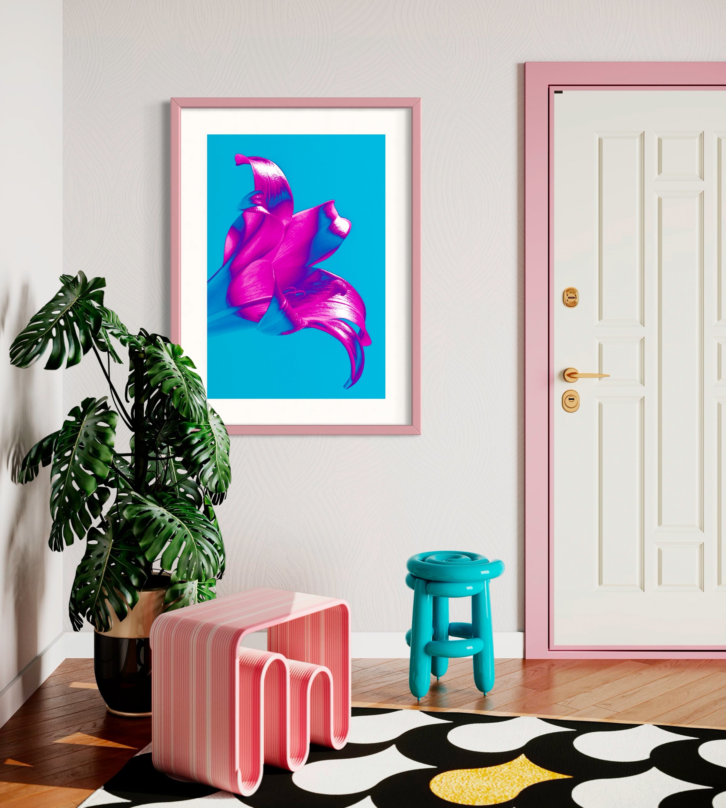 bright pop art photo of pink lily on blue background in pink frame on wall in funky colorful room