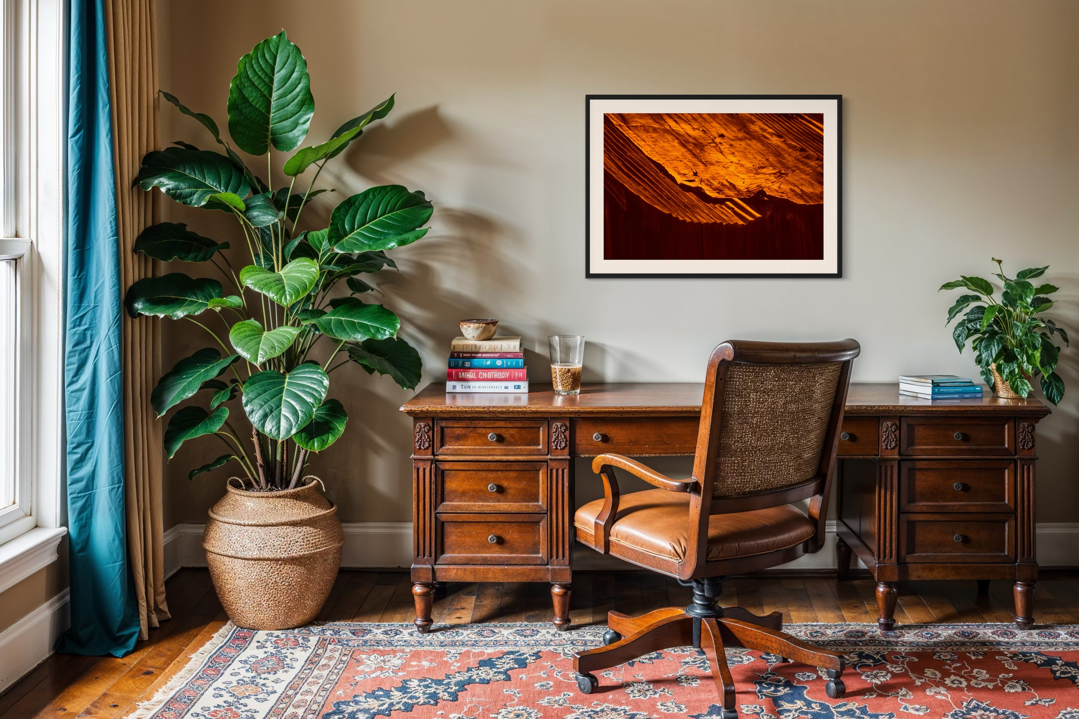 rusty old metal roof on old barn with warm tones photo in black frame with off white matte on tan wall in classic style home office with wooden desk and hardwood floors