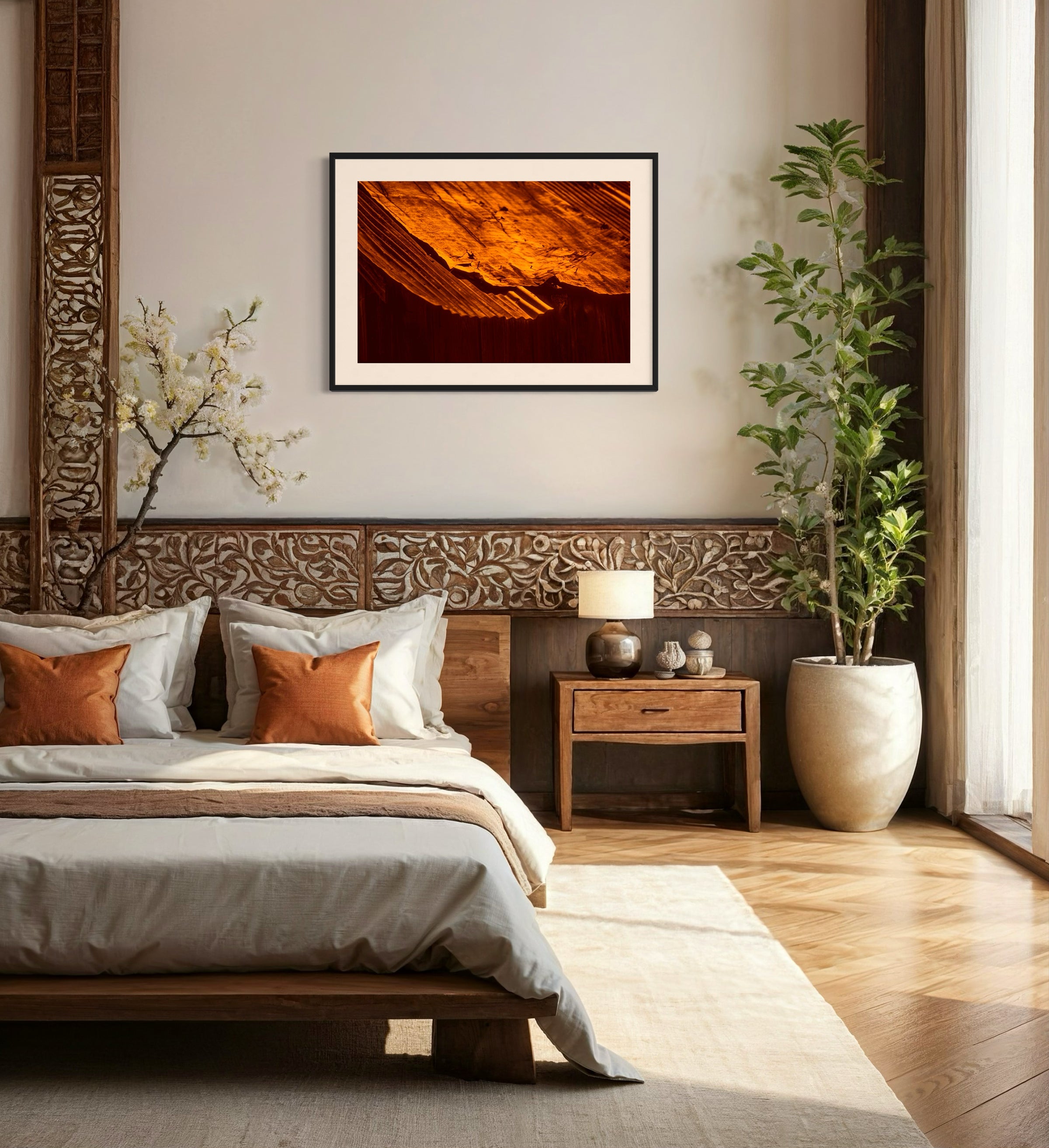 rusty old metal roof on old barn with warm tones photo in black frame on with off white matte on light tan wall in luxurious rustic bedroom with earth tones