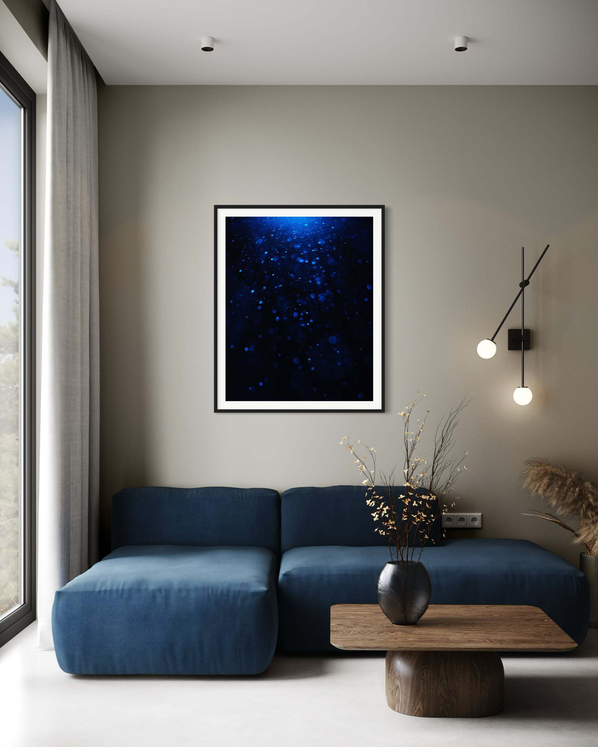 sci fi space looking photo as if close to the exterior of a space ship, blue tone, in black frame with white matte on light tan wall in modern living room with blue couch and wooden square coffee table