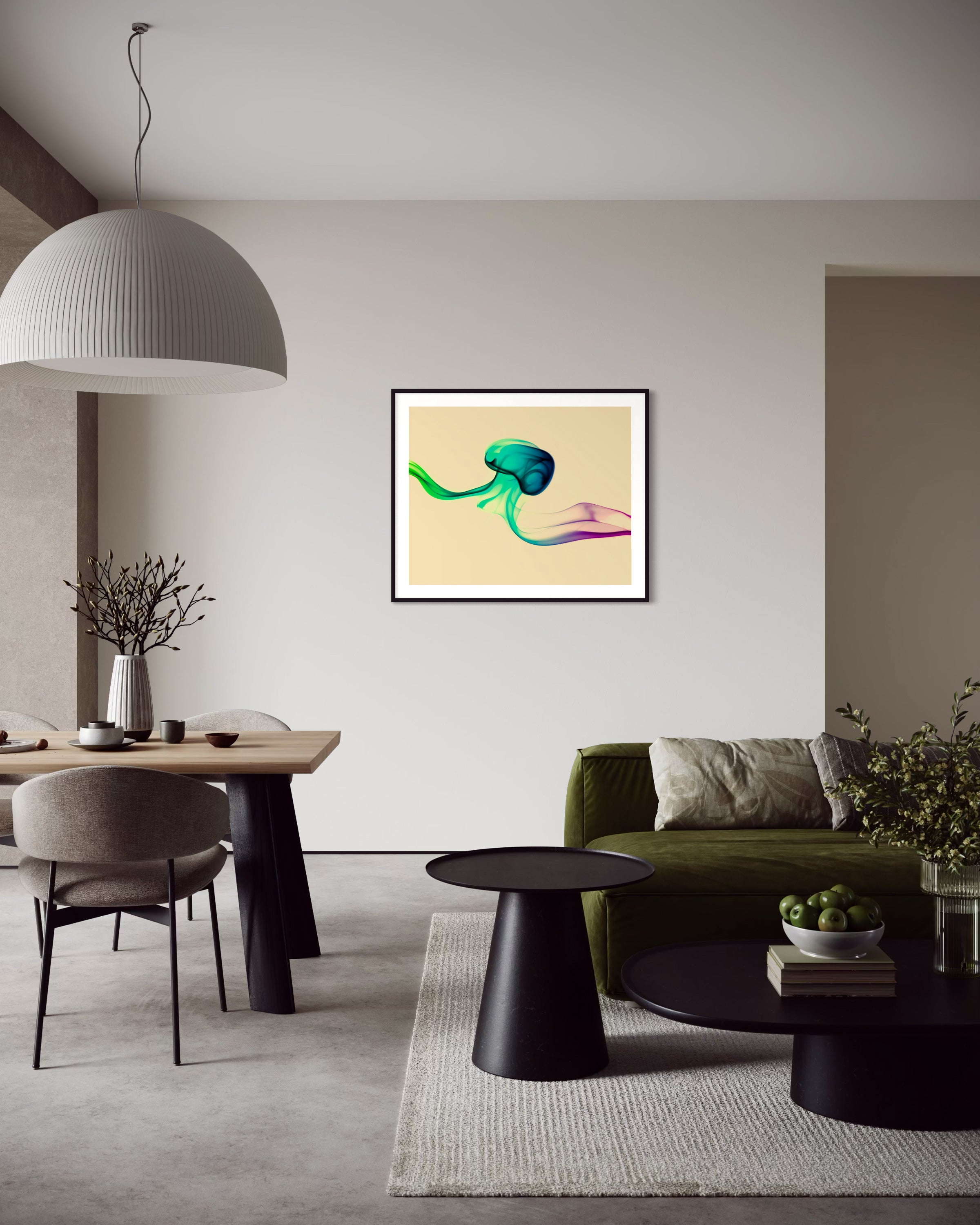 photo of abstract purple, green, blue, yellow wave at the bottom on orange overall in black frame with white matte on white wall in modern living room with olive colored couch an round black end and coffee tables