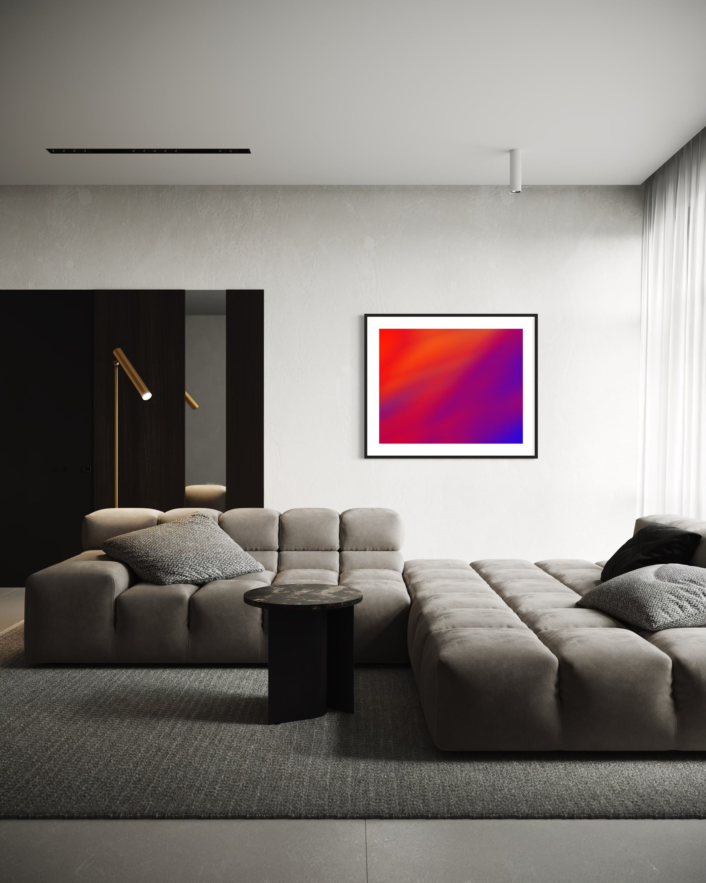 photo of abstract orange, yellow and purple in black frame with white matte on white wall in modern living room with gray tones