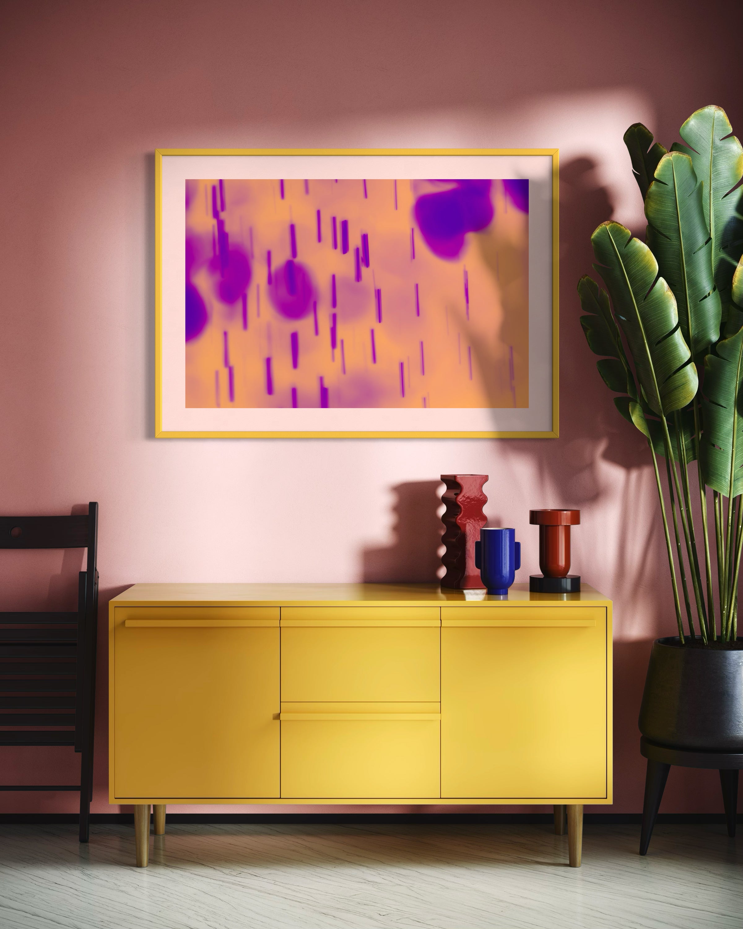 blurred rain in purple on pale yellow background in yellow frame on pink wall in colorful seating area in house